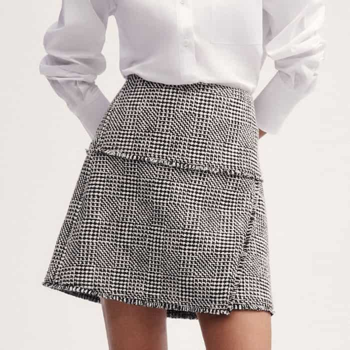 For a contemporary update to classic office dress codes, pair it with our Textured Wrap Front Mini Skirt.