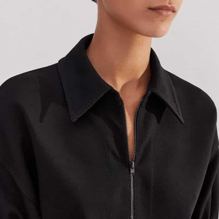 The zip-up neckline can be left undone to accommodate underlayers.