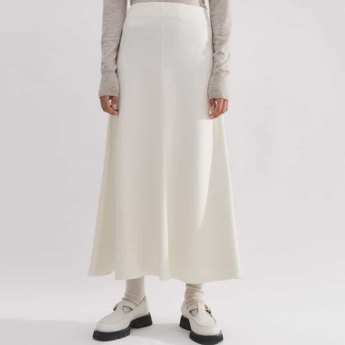 Opt for a coordinated two-piece set with the matching Milano Knit A-Line Midi Skirt.