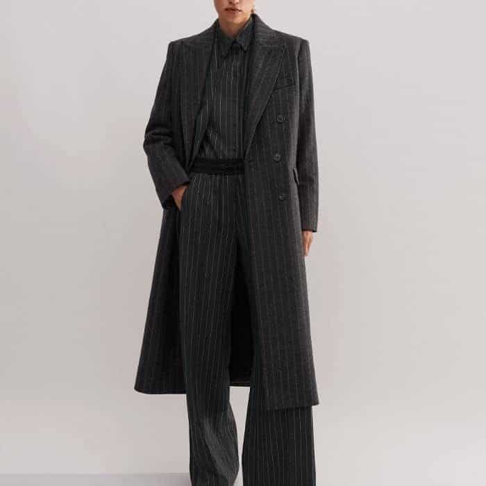 Opt for head-to-toe pinstripes with our three-piece suit in the same pattern.