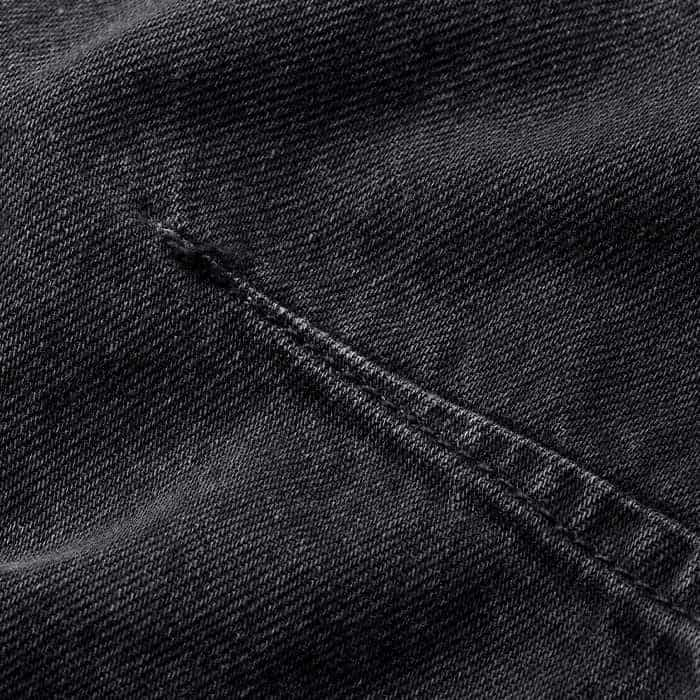 Crafted from washed black cotton denim. 