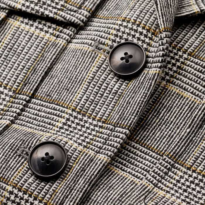 Made from an Italian wool blend in a graphic check.