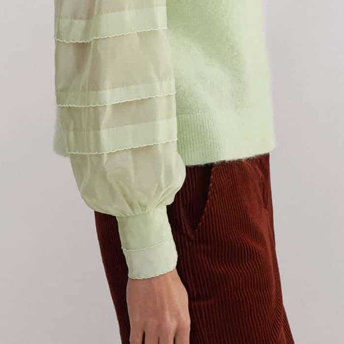 The cuffs are smocked on one side to keep the front free from detail and to keep pushed-up sleeves in place.