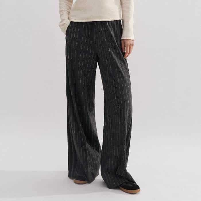 Introduce graphic interest to your look with our Pinstripe Wide-Leg Track Pant.