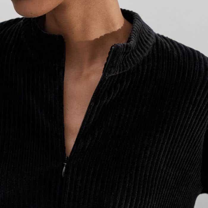 Choose between a high or V-neckline with the discreet front zip. 