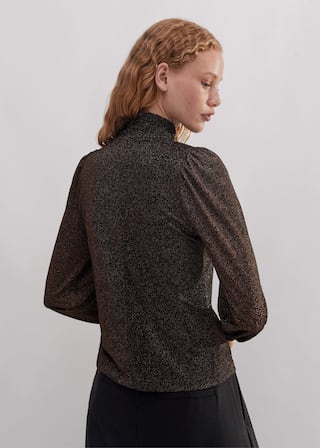 This stretch jersey is infused with metallic fibres for sparkle and texture.