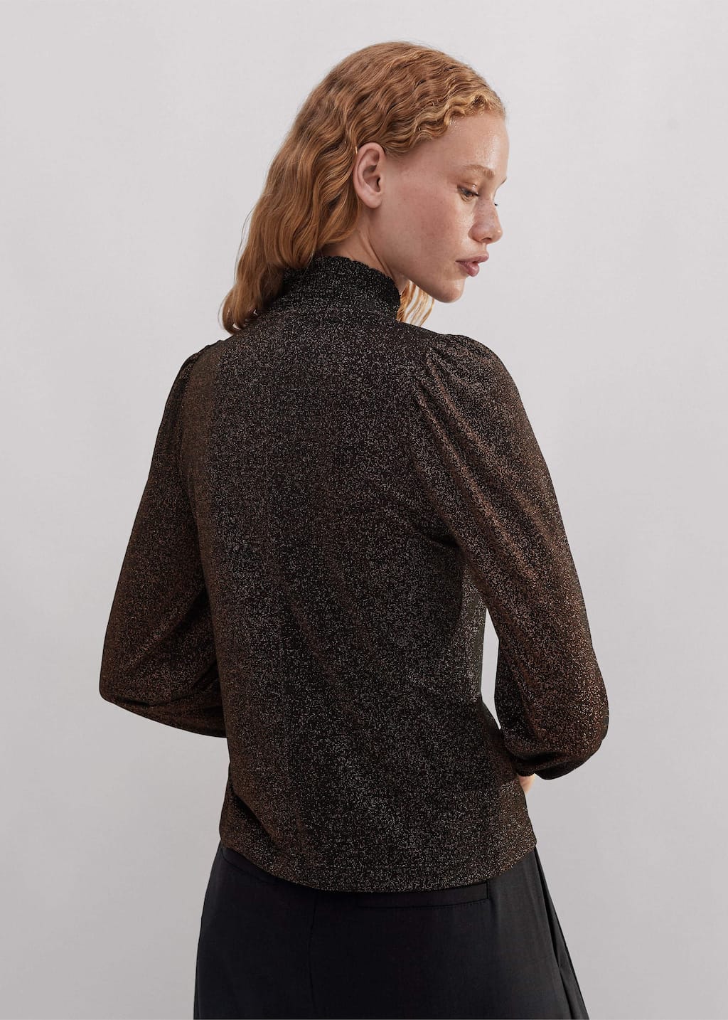 This stretch jersey is infused with metallic fibres for sparkle and texture.