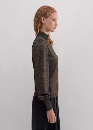 This stretch jersey is infused with metallic fibres for sparkle and texture.