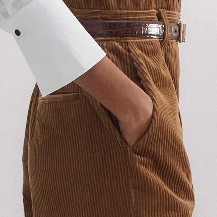 Functional pockets are positioned in front of the side seams to avoid bulk.