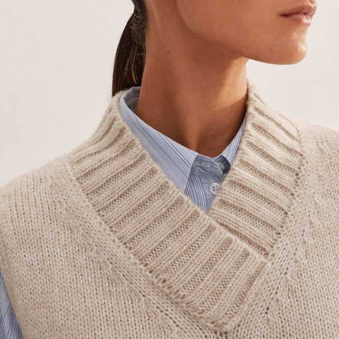 The high V-neckline is heightened with a thick ribbed trim.