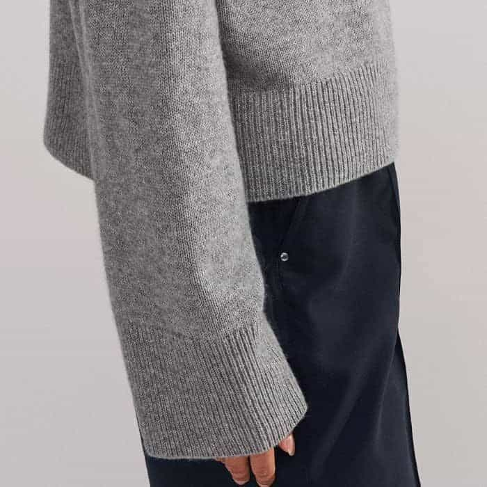 Turn back the cuffs to shorten the length of the sleeves.