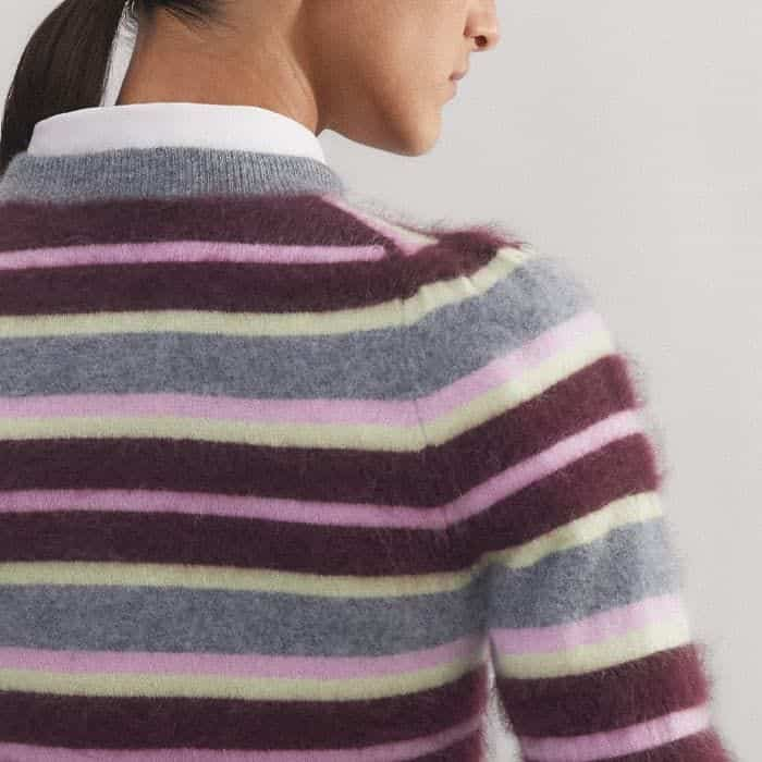 For a sleek, flattering finish, the sleeves have a small pouf at the shoulder.