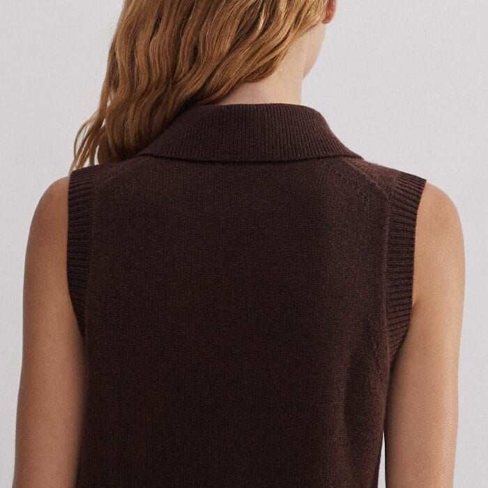 The neckline, armholes and hem are ribbed to maintain the shape of the piece.