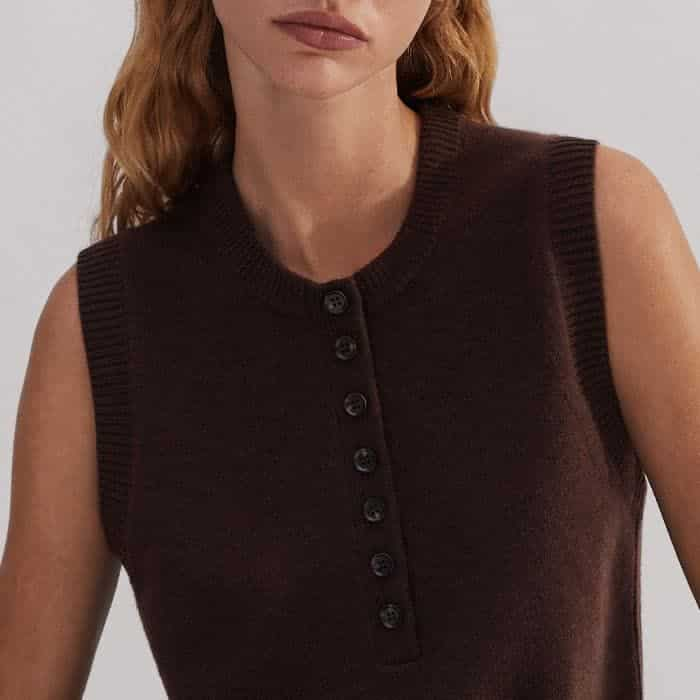 The buttons at the neckline can be left undone to accommodate different bust sizes.