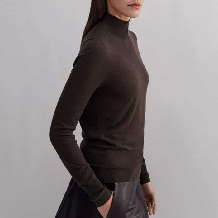 The high neck and full-length sleeves keep every element of your look on display when it’s layered.