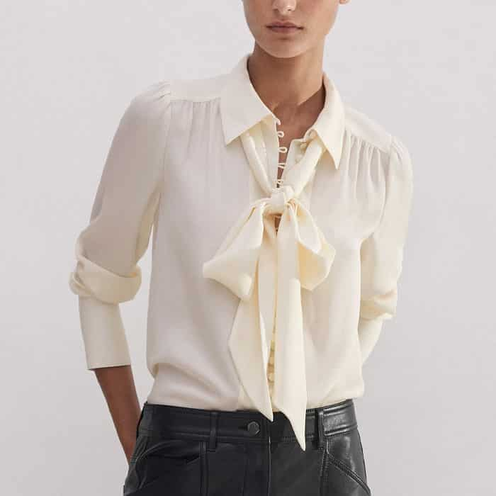 Tuck our Silk Oversized Button Blouse + Tie into the waistband to build a high-low look.