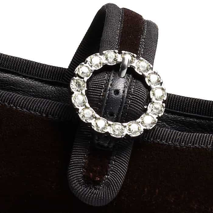 The strap is embellished with a crystal detail to add interest to the black colourway.