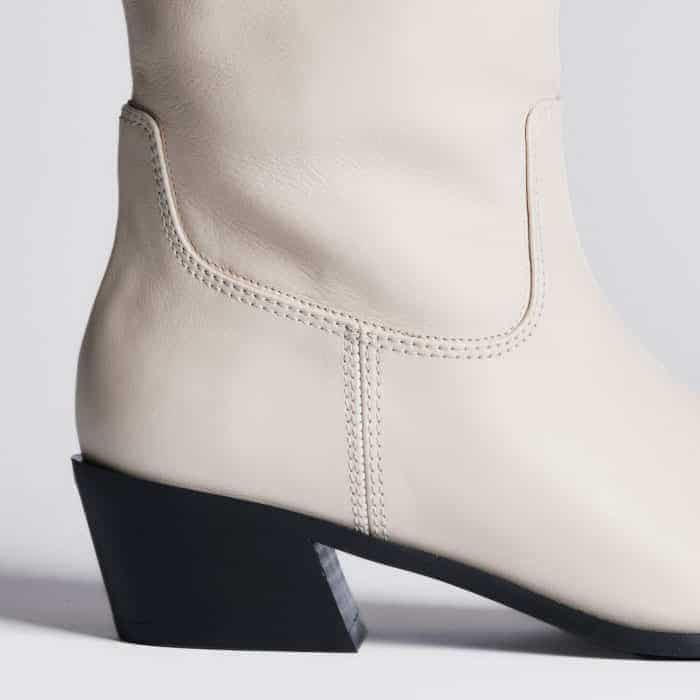 Designed to sit at an angle, the classic western-style heel adds comfortable height.