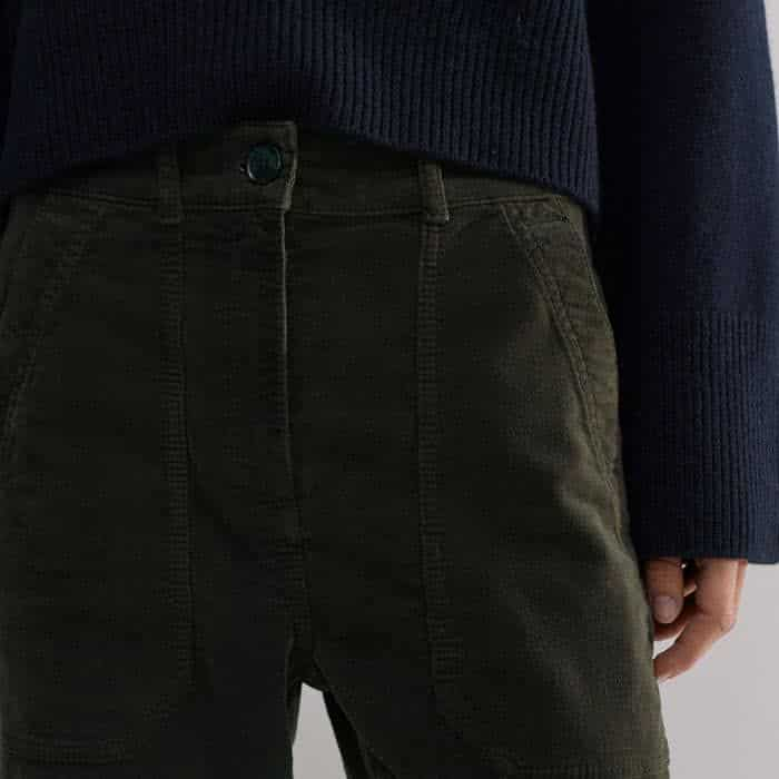 Deep front and back pockets add functionality without adding bulk.