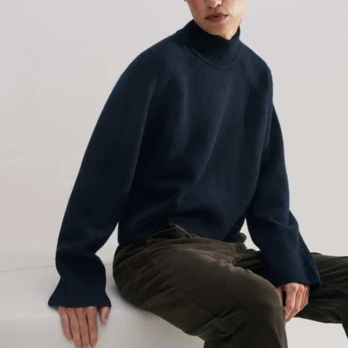 Build a look around a darker colour palette with our Merino Cashmere Curved Hem High Neck Jumper.