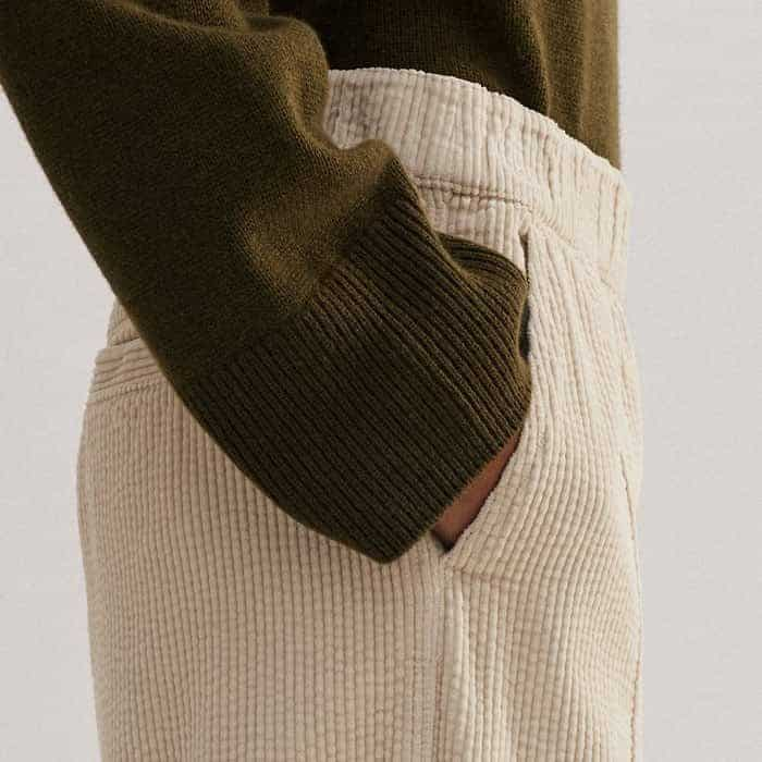 Pockets are flatteringly placed in front of the side seams for a bulk-free finish.