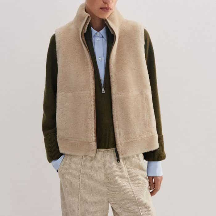 Build a luxuriously tactile look with our Merino Cashmere High Zip Neck Crop Jumper and Reversible Shearling Zip Vest.