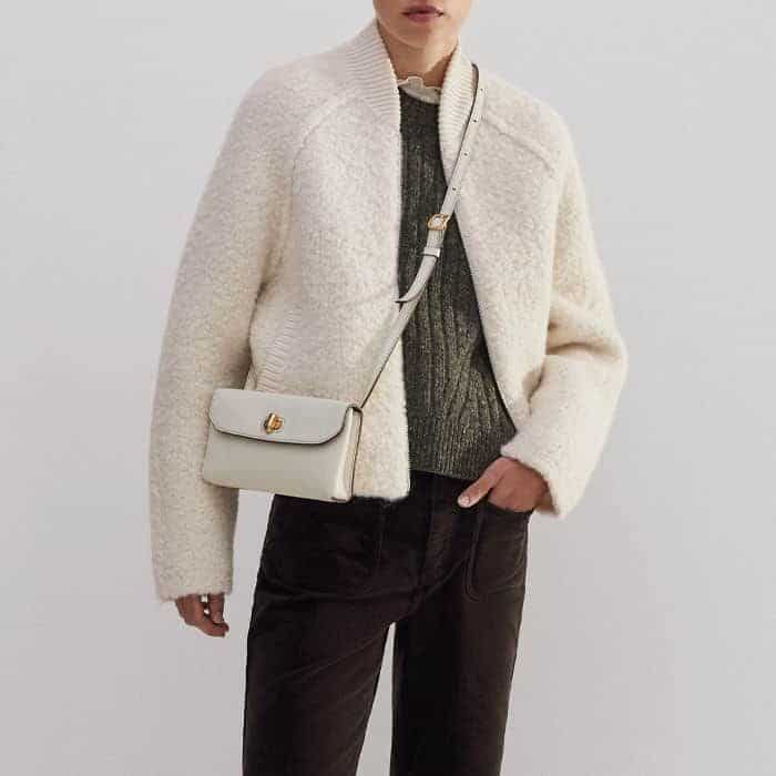 Build a layered look with our Soft Donegal Tweed Fashioned Rib Vest and Chunky Wool Bouclé Knit Bomber.