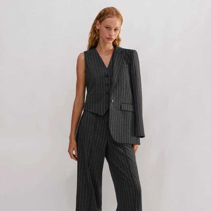 Opt for a three-piece pinstripe suit with the Pinstripe Tailored Vest and Tomboy Blazer.