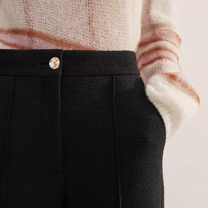 Pockets find a home in front of the side seams for a bulk-free, functional finish.