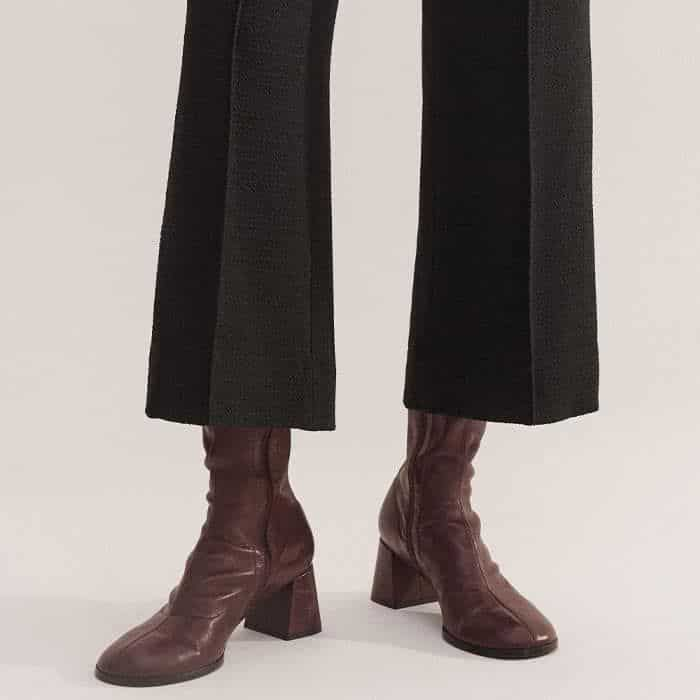 The cropped length complements styling with both loafers and ankle boots.