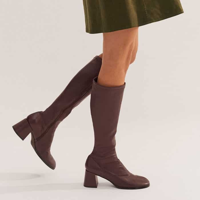 Complement the above-the-knee hem with our Oxblood Stretch Knee-High Boot.