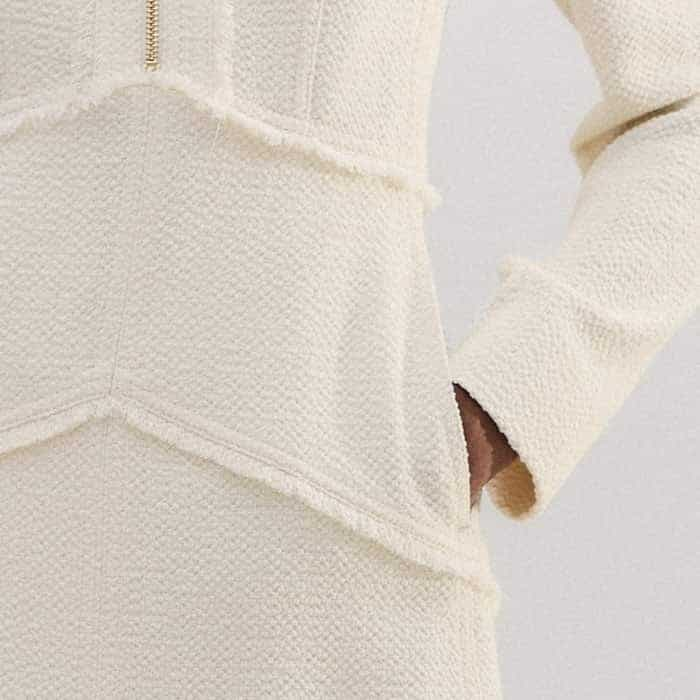 Pockets are flatteringly placed in front of the side seams for a bulk-free finish.