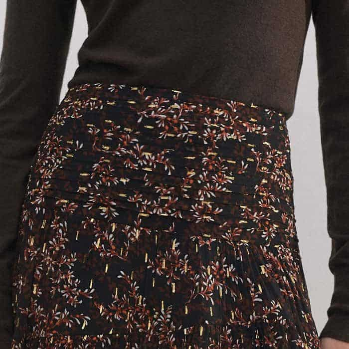 The fabric gathers at the waist to cinch you in and provide flattering coverage.