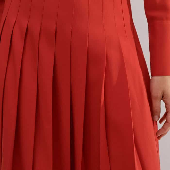 For added dimension and a flattering fit, this style is pleated.