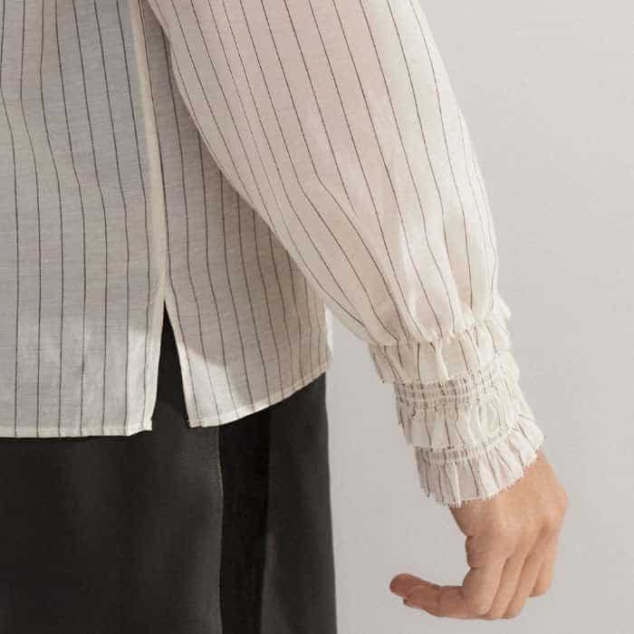 The deep cuffs are elasticated to keep pushed-up sleeves in place.