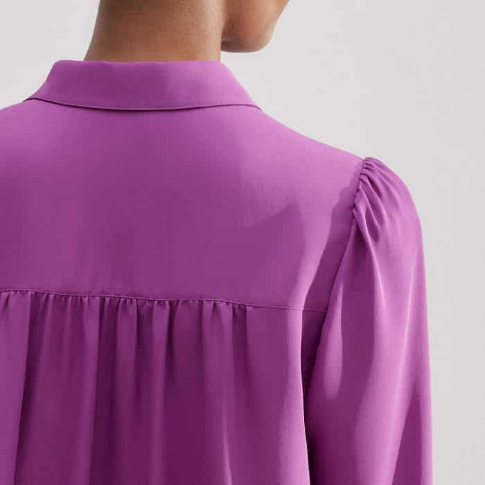 Creating the illusion of a narrower shoulder, the pouf at the top of the sleeves is positioned slightly further in towards the neckline.