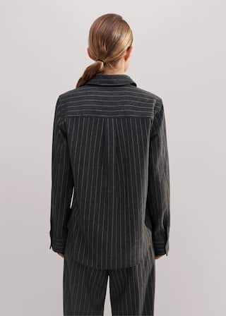 Made from Italian wool-blend tailoring fabric with a subtly brushed surface and camel-hued pinstripes.