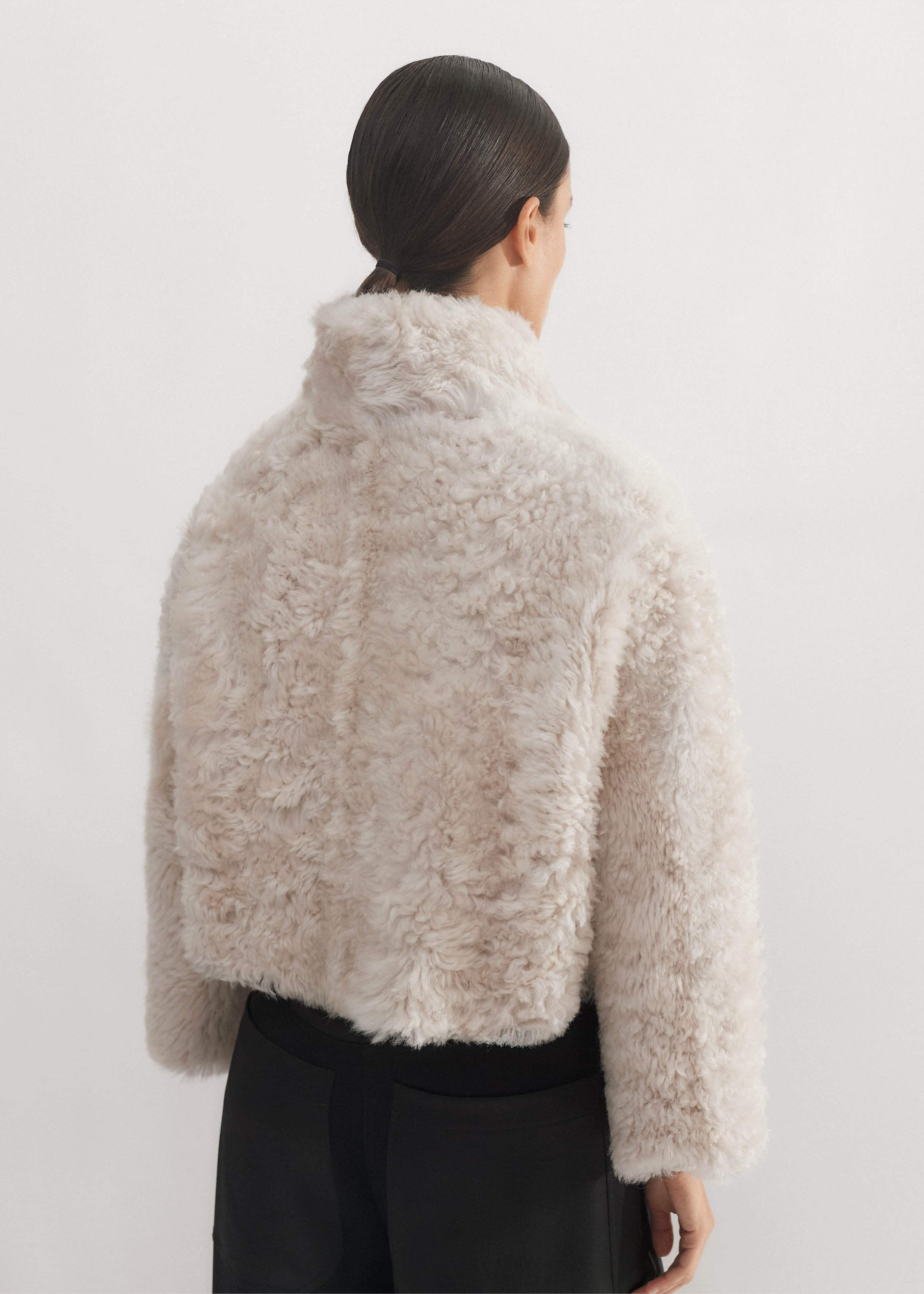 Crafted from by-product shearling. All our leather and shearling is a by-product of the food industry.