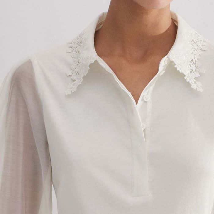 Adjust the amount of coverage at the neckline with the half-button placket.