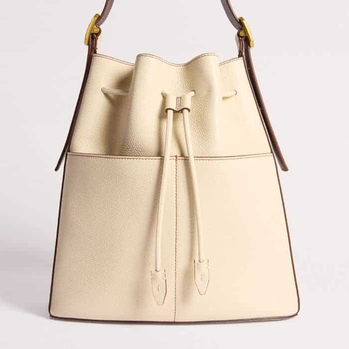 The slouchy shape of the bag can be drawn in with the drawstring cord.