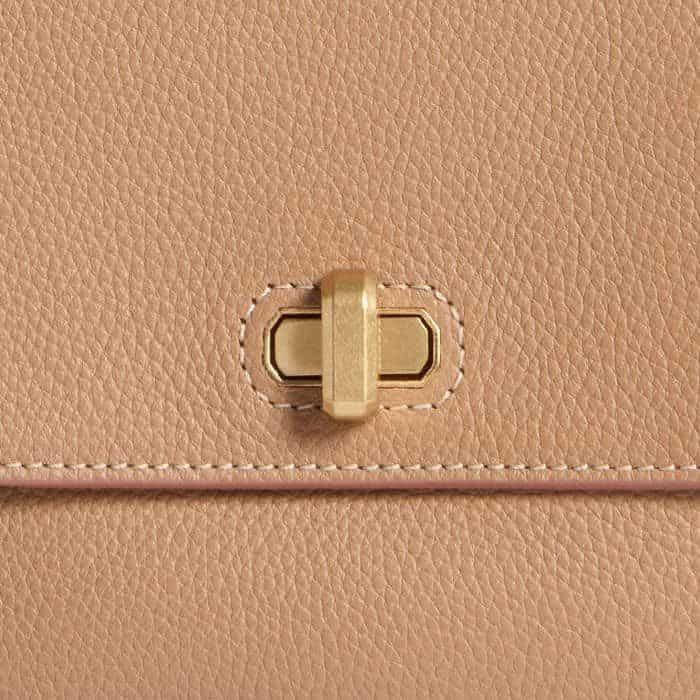 The bag closes with a twist-and-lock fastening for a secure finish.