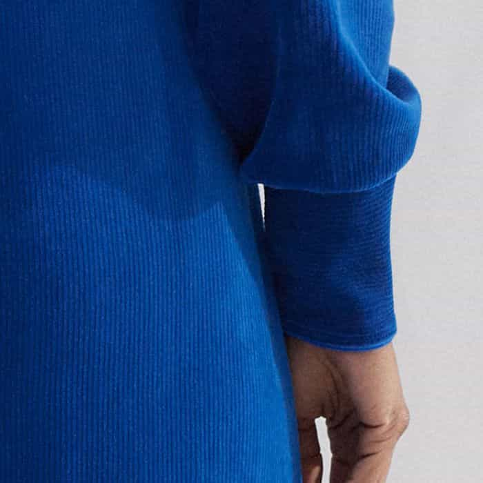 The full-length sleeves fall to fitted cuffs to maintain a voluminous shape.