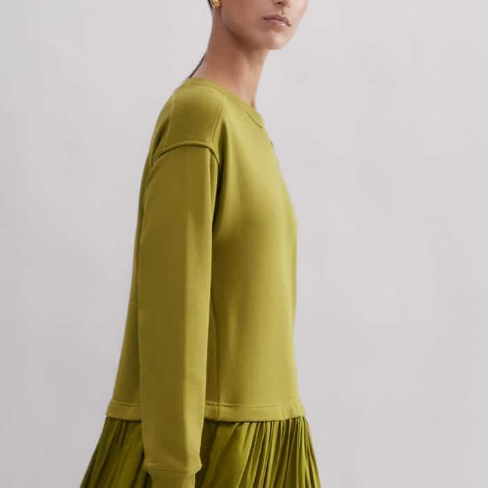 The dropped shoulder seam creates a flattering drape through the sleeves.