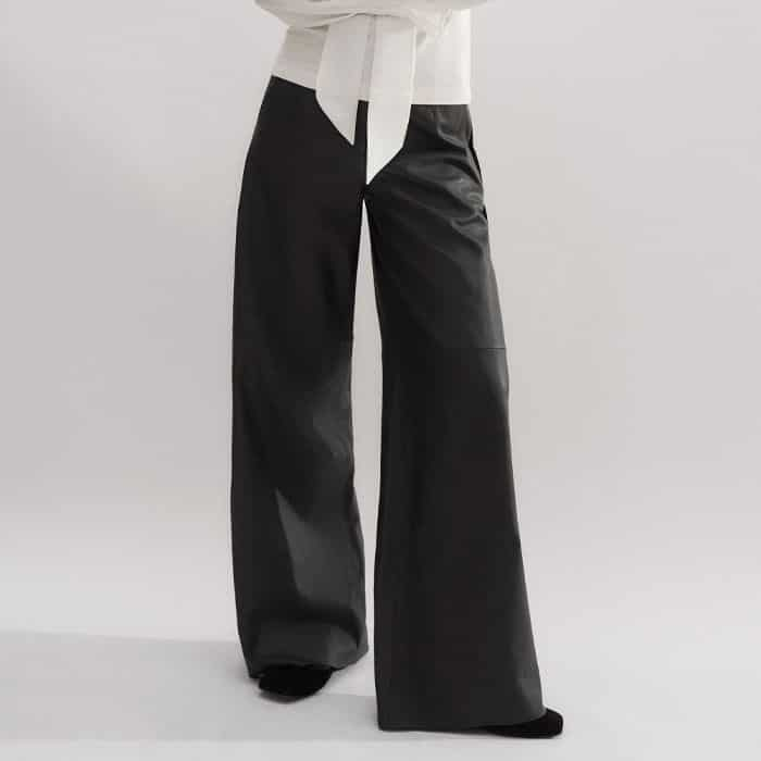 Our Ultra-Soft Leather Wide-Leg Trouser introduces a new texture to your look.