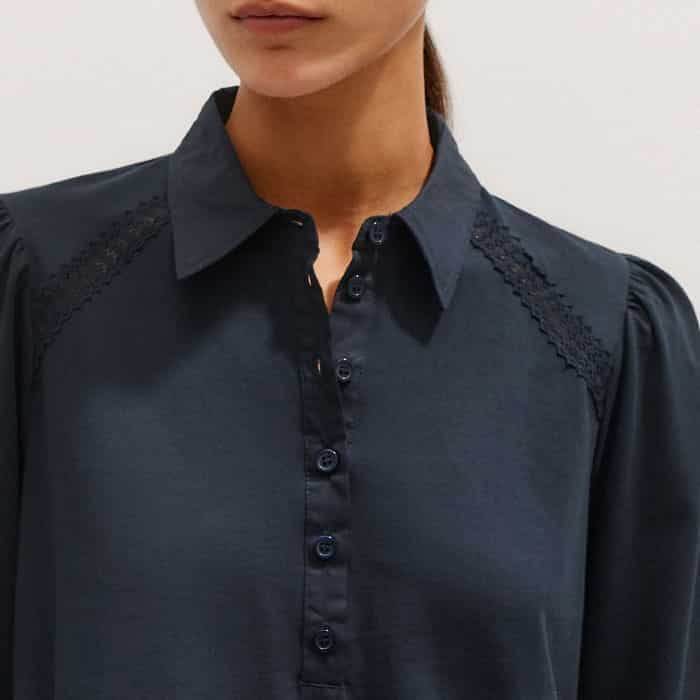 The half-button placket can be left undone for a more relaxed finish.