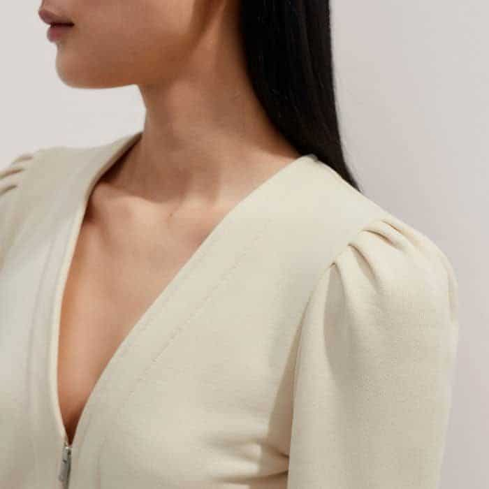 Creating the illusion of a narrower shoulder, the pouf at the top of the sleeves is positioned slightly further in towards the neckline.