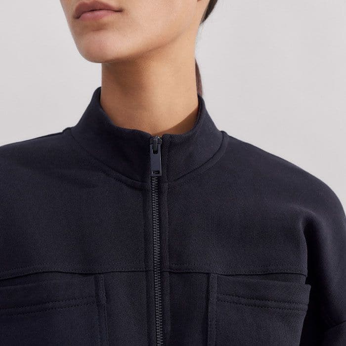 The zip at the neckline can be left undone to accommodate additional base layers.