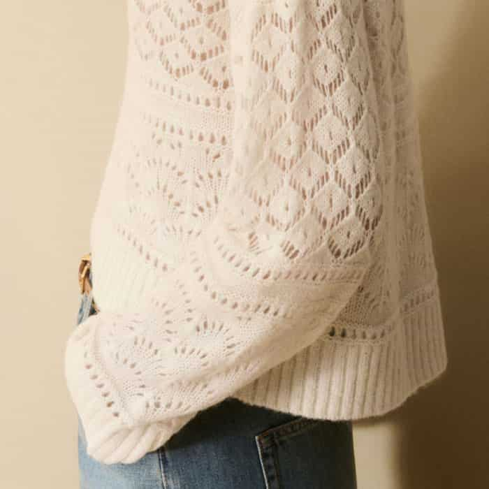 The piece curves lower at the back and is slightly cropped at the front to tuck in with ease.