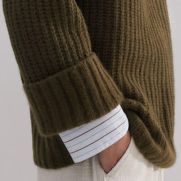 The deep cuffs can be turned back to shorten the length of the sleeves.