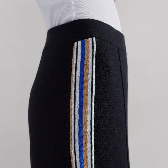 A colourful side stripe draws the eye down and works to visually elongate the leg.